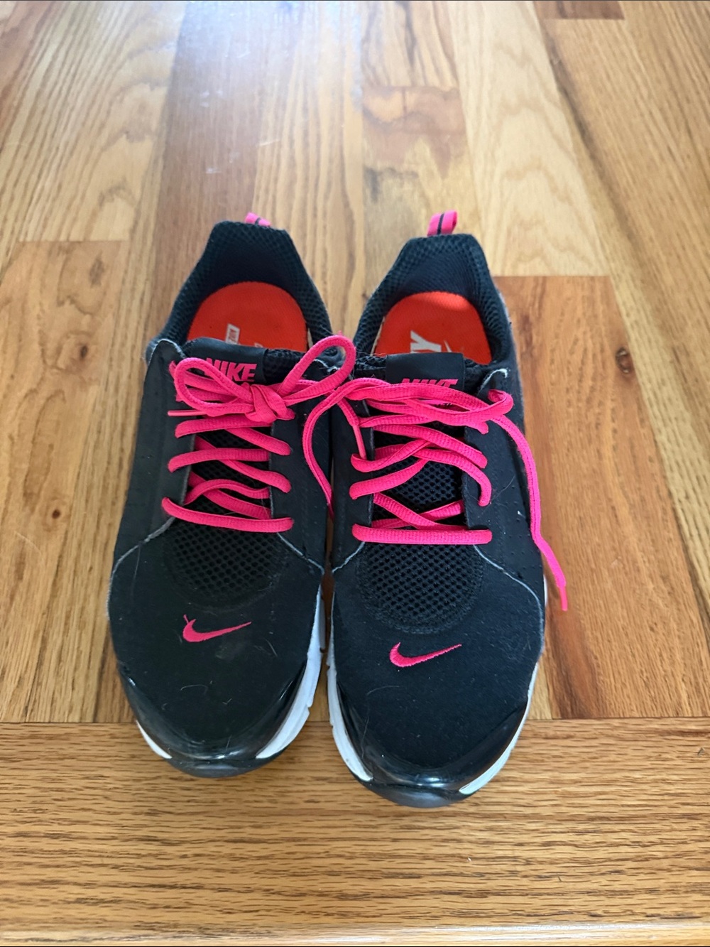 Women’s Nike Black Athletic Sneakers with Pink Accents